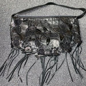 Leather purse with flower design
